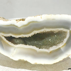 Agate Geode with Wise Guy Crystal Smirk | New Earth Gifts