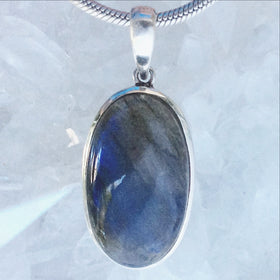 Labradorite Oval Sterling Silver Pendants-Several Choices. Hauntingly beautiful Labradorites - Check out their mysterious allure! Traditional setting 1.75" long - New Earth Gifts
