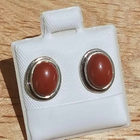 Sterling Silver Red Jasper Stud Earrings show Jasper's earthy color in a classic oval setting. Wearing these Red Jaspers will definitely adjust your attitude! New Earth Gifts