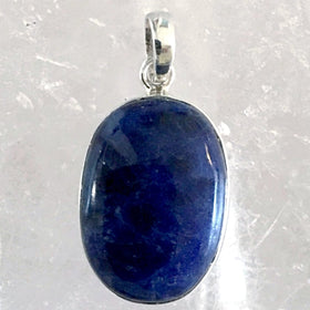 Sterling Sodalite Oval Pendant, in a classic dainty style, has deep navy color. The highly polished 20mm Sodalite gemstone is strikingly beautiful! 1" pendant. New Earth Gifts