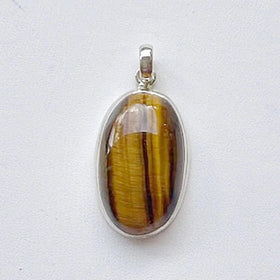     Tiger_Eye_Pendant_3_c72f03f1-af4d-4608-8363-d458674ff692  1024 × 1024px  Tiger Eye Sterling Silver Elongated Oval Pendant -New Earth Gifts