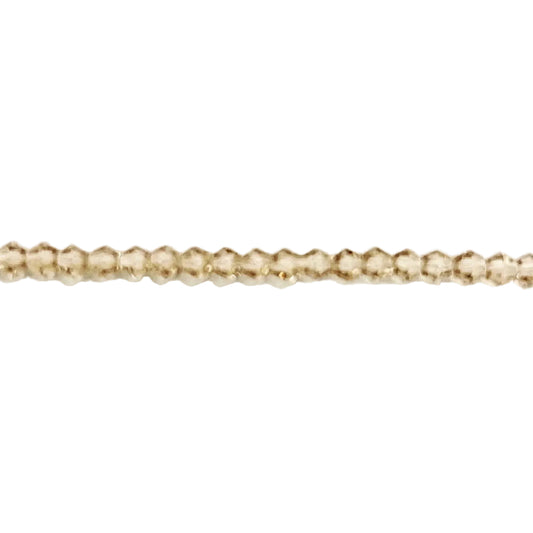 &nbsp;Crystal champaign faceted bicone beads with a thunder-polished glass finish.