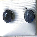 Sterling Silver Labradorite Stud Earrings. The ½” x ¼” ovals reveal Labradorite's mysterious allure. Delicate and light-weight studs look great with any attire. New Earth Gifts