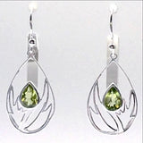 Sterling Peridot Faceted Flower Earrings. 1.5" long, abstract floral setting