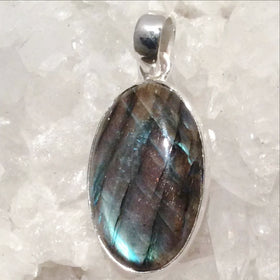 Remarkable Labradorite Pendant Showing Magical Veining and set in Sterling Silver. Check out the Labradorite flash in these beautiful oval pendants, 1.5" long. - New Earth Gifts and Beads